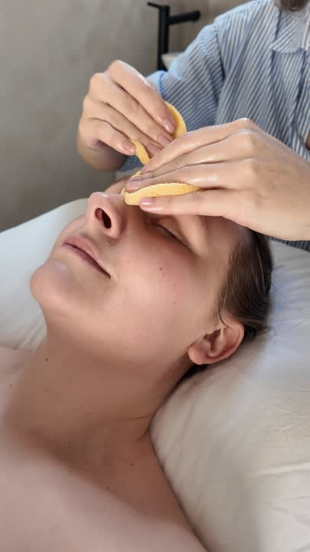 Post-microneedling calming masque during a facial
